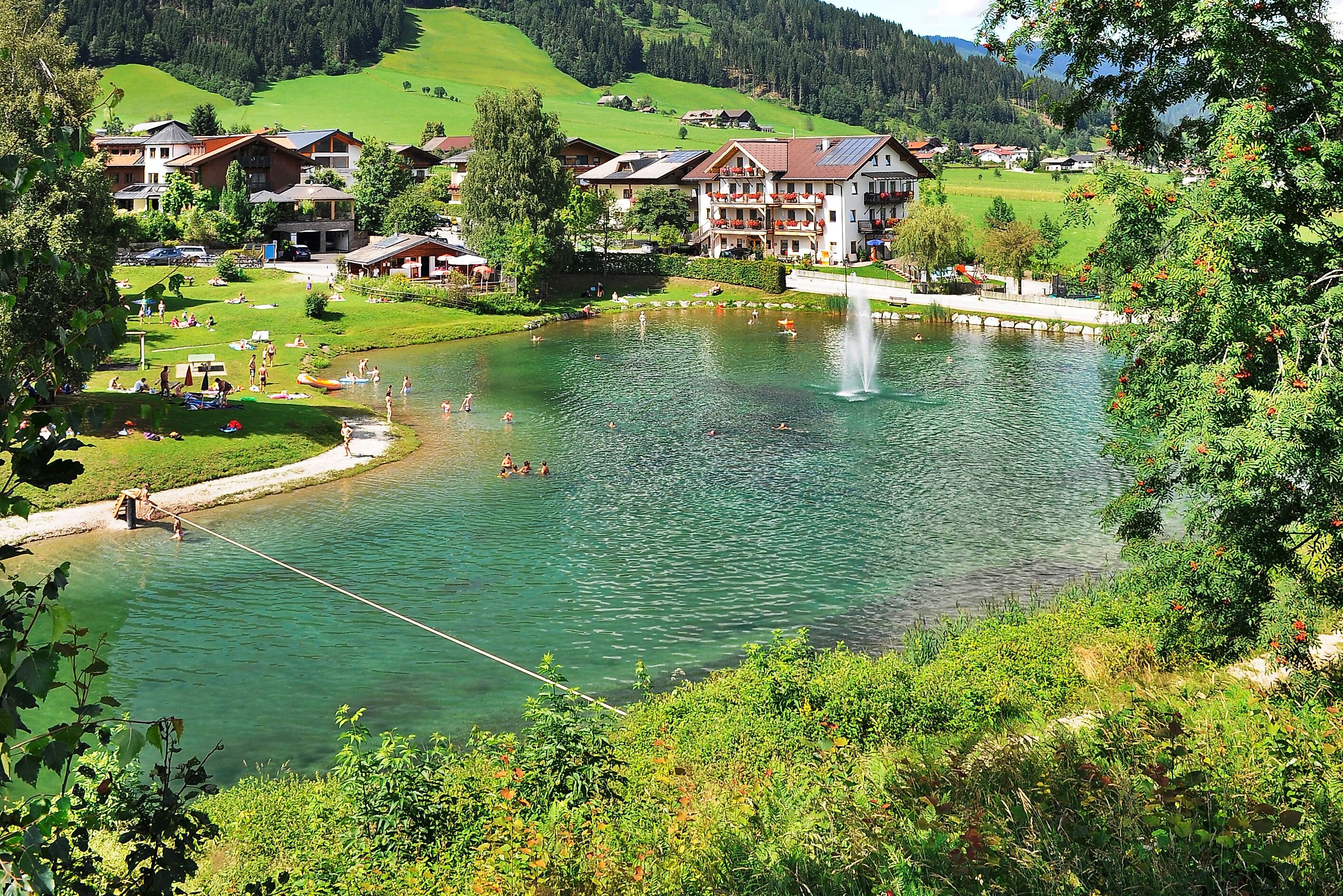 <p>Auszeit beim Badesee Reitdorf im Sommerurlaub in Flachau</p>